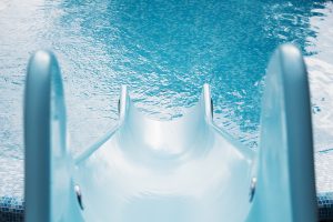 Blue Swimming Pool With Water Slide For Background, High Resolut Blue Swimming Pool With Water Slide For Background, High Resolut