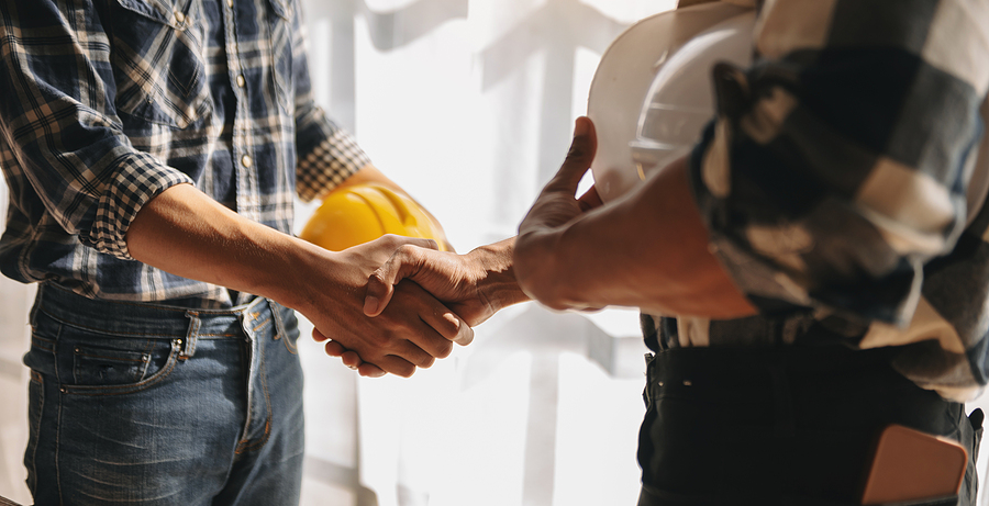 Engineer And Contractor Join Hands After Signing Contract,they A