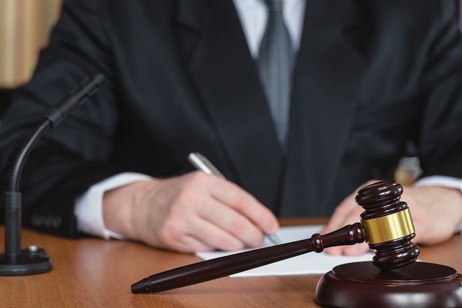 Lawyer And Court. Judge Hits The Table With Hammer. In The Court