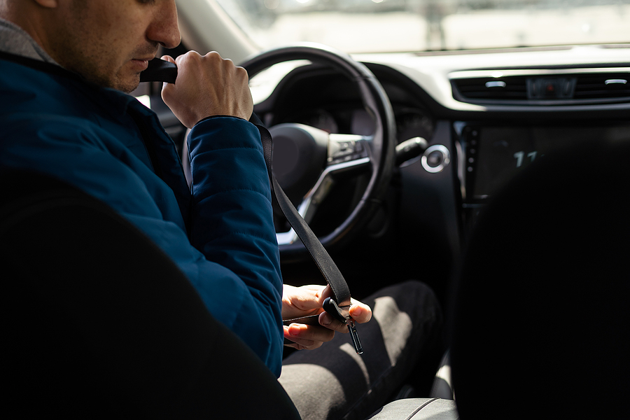 Mens Hand Fastens The Seat Belt Of The Car. Close Your Car Seat